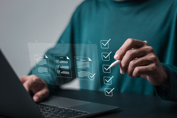 Person use laptop to Approve document on virtual screen for business process workflow illustrating management approval and and project approve concept.
