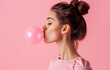 © Boris - Bubblegum Chic: Croc-Adorned Girl Blowing a Giant Pink Bubblegum Balloon on a pink Background