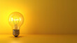 idea light bulb on yellow background