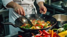 Close-up of a chef preparing a delicious vegetable stir-fry