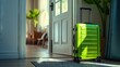 Bright green suitcase by an open door symbolizing readiness for a new journey