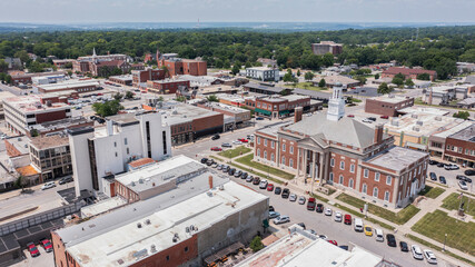 independence, missouri, usa - june 16, 2023: afternoon sunlight shines on the historic core of downt