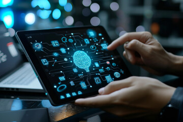 A person is using a tablet with a brain on the screen
