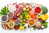 Fototapeta Kuchnia - Food pyramid: Top view of various kinds of multicolored food types like meat, seafood, honey, eggs, fish, cocoa beans, olive oil, legumes 
