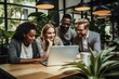 © Dina - diverse business team at meeting at modern office looking at the screen of laptop, smiling and discussing project