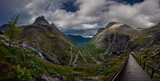 Fototapeta  - Trollstigen Viewpoint Winding Road and Beautiful Waterfall -Norway Travel