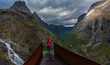 Traveling Norway - Woman admires views from the Trollstigen platform