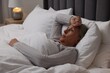 © New Africa - Menopause, night sweat. Woman suffering from hot flash in bed