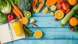 Healthy eating with Workout and fitness dieting ,fitness and weight loss concept, fruit, Vegetable and orange juice,notebook,top view on blue wooden background, Food and health