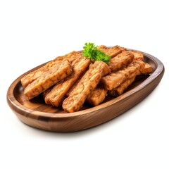 Wall Mural - a fried tempeh on a serving tray on the table, studio light , isolated on white background