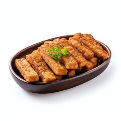 Wall Mural - a fried tempeh on a serving tray on the table, studio light , isolated on white background