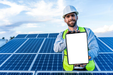 young engineer showing a tablet with blank empty screen, smiling technician holding a device with transparent screen