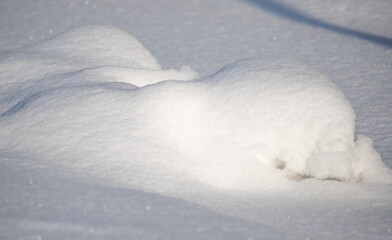 background of white snow under the sun