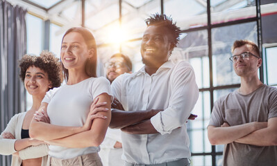 Smiling professional business leaders and employees group team portrait