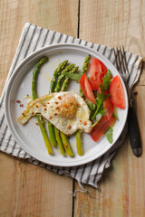 Sticker - A spring dish of asparagus with an egg