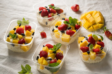 Wall Mural - Portion containers with cottage cheese dessert for a picnic