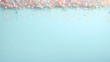 © Nittaya - Confetti colorful on pastel background withe text space.