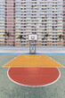 © Westend61 - Basketball court in front of building