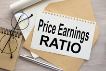PE - Price To Earnings Ratio Text On The Page On The Envelope