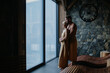 © Halfpoint - Beautiful couple standing in hotel wellness, enjoying romantic weekend in spa. Concept of Valentine's Day.