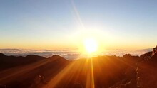 Timelapse Of Sun Rising Over Clouds By Haleakala National Park, Hawaii