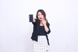 © Ajab - Beautiful Indonesian office woman in her 20s, expression of surprise, promotion on cellphone gadget screen in the future for promo, isolated on white background