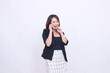 © Ajab - the charm of a beautiful Asian office woman in her 20s, cheerful expression, making a phone call on a cellphone while holding inspiration, isolated on a white background