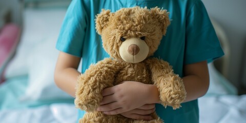 Wall Mural - Little girl with teddy bear in hospital