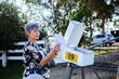 © Austockphoto - Mature aged woman checking her mailbox for letters