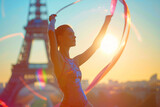 Beautiful girl gymnast with ribbon on the background Paris