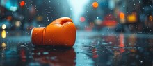 A Single Orange Boxing Glove Lies Abandoned On A Rain-soaked City Street, Capturing A Gritty Urban Atmosphere And The Resilience Of A Fighter