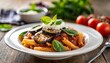 © Patti - pasta alla norma delicious sicilian pasta dish with roasted eggplant marinara tomato sauce grated ricotta and fresh basil