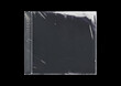© Print - CD disk video case on black background. Isolated music transparent mockup. Clean cover box template.