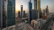 © HyperlapsePro - Aerial view of Dubai International Financial District with many skyscrapers timelapse.