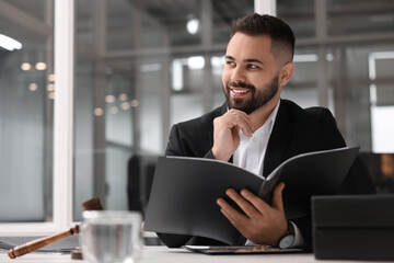 Sticker - Smiling lawyer with folder in office, space for text