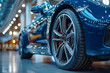 © Simonforstock - Modern and new car in dealer service, close-up view on wheels