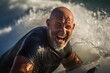 Portrait of a happy  senior surfer in the water at the beach. Sport concept. Vacation and Travel Concept with Copy Space.