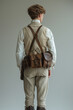 Rear view on stylish man wearing in 19th century times victorian clothes