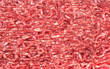 Fresh beef minced meat texture for background, view from above. Raw beef forcemeat.