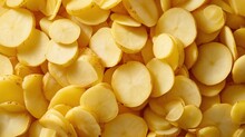 A Pile Of Sliced Yellow Potatoes Sitting On Top Of A Pile Of Sliced Yellow Potatoes On Top Of A Pile Of Sliced Yellow Potatoes On Top Of Sliced Yellow Potatoes.