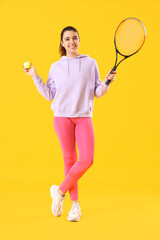 Sticker - Young woman with tennis racket and ball on yellow background