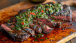 © Justlight - A zesty chimichurri sauce bursting with fresh herbs and the smoky kick of smoked paprika. The sauce is drizzled over juicy slices of grilled flank steak creating a perfect
