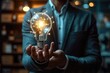 © visoot - Businessman holding a light bulb in his hand. symbolizing a new business idea for company growth. holographic glowing particles. Generative AI.