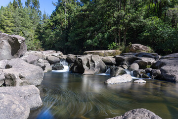 Sticker - Soft effect of tumbling water in rocky stream at McLaren Falls