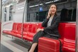 © StockPhotoRepublic - Young Asian Businesswoman Using Phone On The Public Skytrain