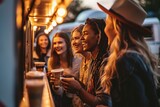 Fototapeta Londyn - Candid shot of a diverse group of friends laughing and socializing outside a food truck during a summer outing, capturing a moment of joyful camaraderie, Generative AI