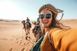 Happy tourist having fun enjoying group camel ride tour in the desert - Travel, life style, vacation activities and adventure concept, Generative AI