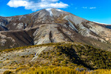 Fototapeta Krajobraz - panorama of mountains in torlesse tussocklands national park, canterbury, new zealand south island; trail to trig m with panorama of alps and lake lyndon