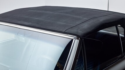 Poster - Black convertible top on a car