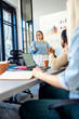 © Zoran Zeremski - Diverse group of young business people working on new project together in office.